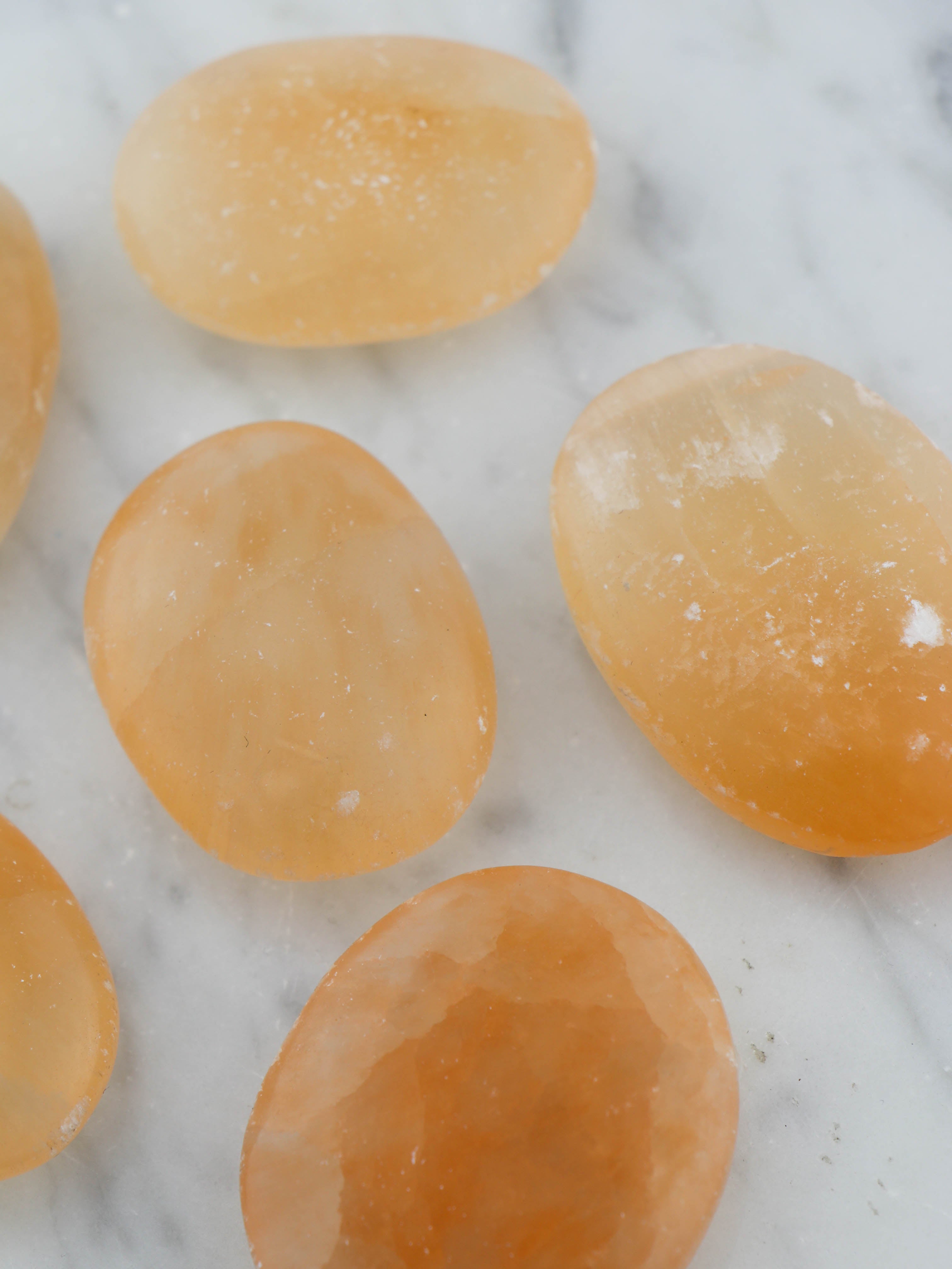 Orange selenit palmstone
